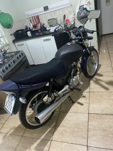 Moto quitada file doc e recibo na mão
