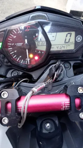 Moto em bom estado, abaixo da tabela Fipe, bateria nova, amortecedor novo, pneus em bom .
