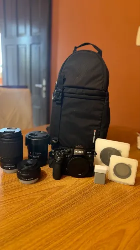 Nikon Z50 II + 3 lentes Viltrox/Nikkor + filtros e 2 baterias