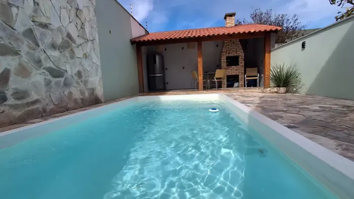 Sobrado lateral semi mobiliado com piscina no Jardim Rio Vermelho - Escritura Pública