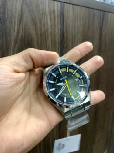 Relógio ORIENT novo analógico de pulso  prateado prova d?água com 01 ano de garantia 