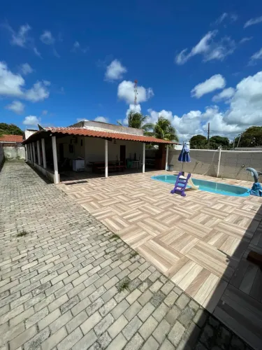 Casa próxima a praia. Aceita trocas Há 200 metros da rodovia