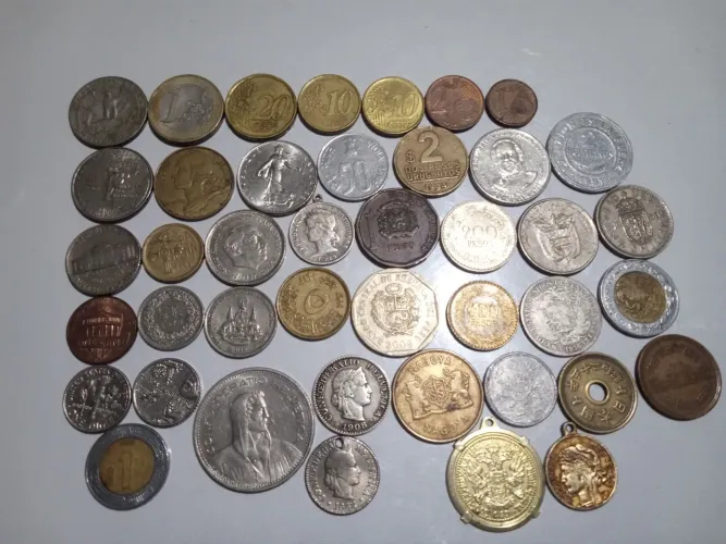 Colecionadores estou vendendo minhas moedas apenas o conjunto todo aceito proposta