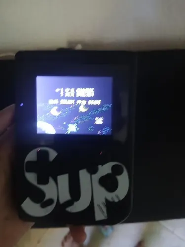 Vendo game psp 400jogos com carregador e fio pra bota na tv