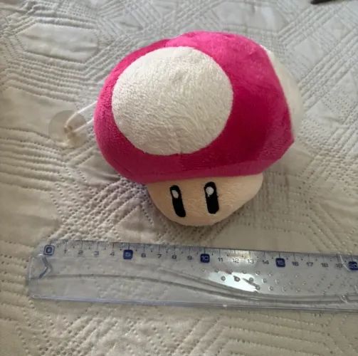 cogumelo de pelúcia rosa do universo Mario Bros  