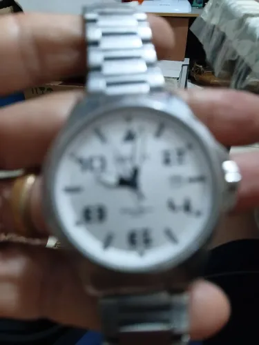 Relógio orient original, tem que fazer uma revisão 