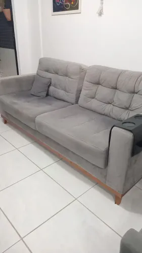 Sofá um ano de uso  ótima conservação funcionando normal 