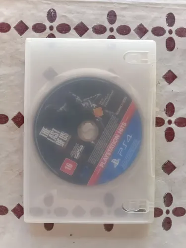 Jogo PlayStation 4 PlayStation Hits: The Last Of Us Resmaterizado Semj-Novo Funcionando