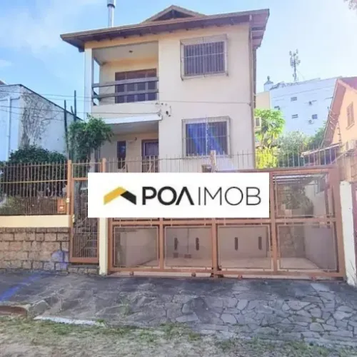 Casa com 4 dormitórios para alugar, 325 m² por R$ 2.730,00/mês - Medianeira - Porto Alegre