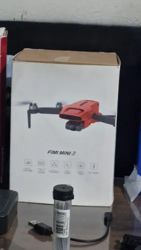 Drone fimi mini 3 com bateria plus é cartão 32 gb