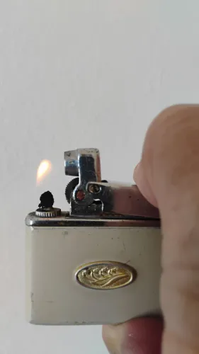 ISQUEIRO DÉCADA DE 60 DE BOLSO