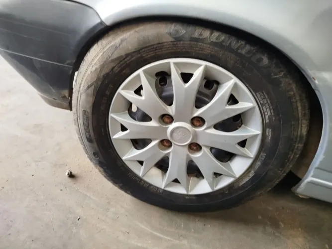 Roda 13 Fiat com pneu mais ou menos 