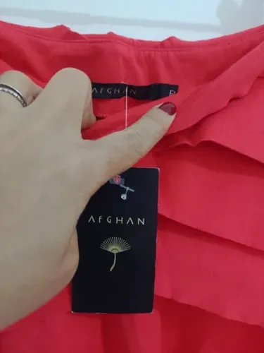 Minissaia da marca afghan linda 