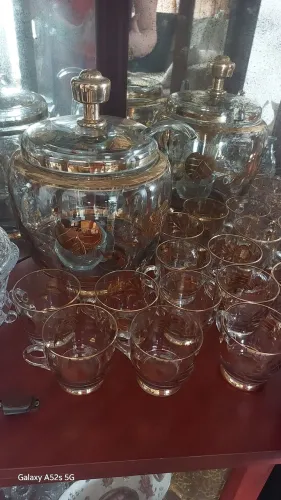 Poncheira em cristal, com concha de Cristal,folhas douradas. Nova