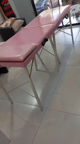 Maca de massagem em formato de mala.