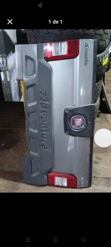 Tampa traseira Fiat Strada 2010/2013 original 