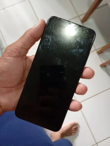 Celular com defeito