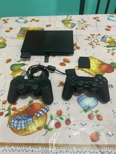 ?PS2 slim + controles?