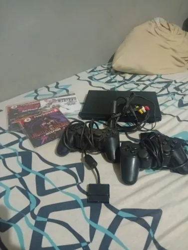 Playstation 2 troco ou vendo, perfeito pra quem quer viver um clássico