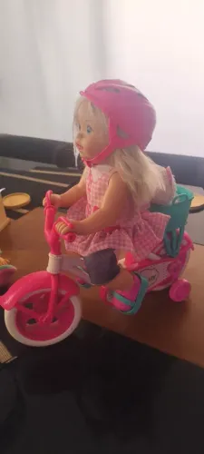Boneca Little Tommy primeiro passeio