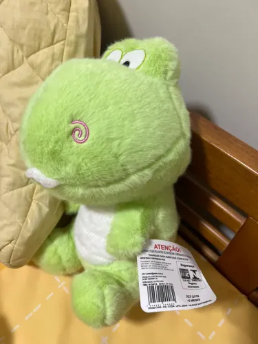 Dinossauro de pelúcia