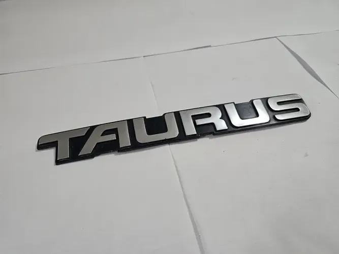 Ford Taurus emblema tampa traseira original 
