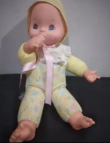 Boneca antiga da estrela chupa dedo