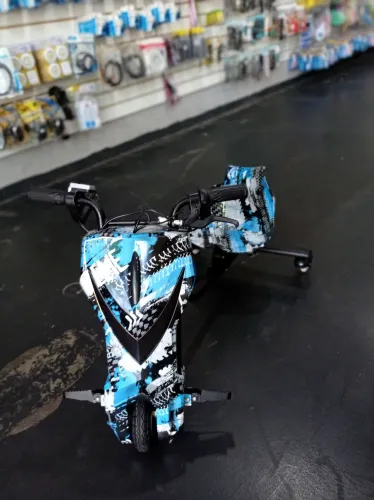 Triciclo elétrico com amortecedor