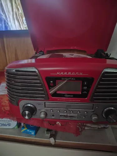 Toca disco Harmony ,semi nova com nota fiscal,manual e controle remoto,