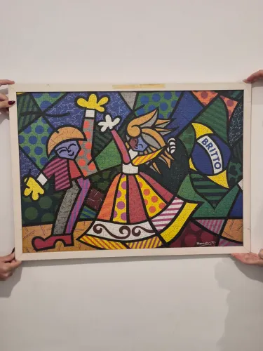 Quadro quebra cabeça Romero Britto.
