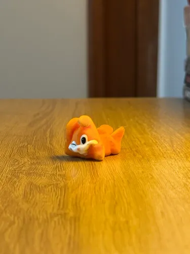 Coelho kinder ovo laranja veludo