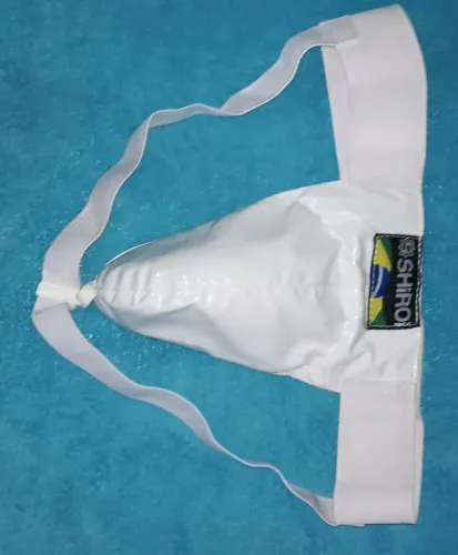 Coquilha para proteção das partes genitalhas do homem