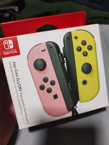 Joy con rosa pastel / amarelo pastel ORIGINAL NOVO - Nintendo Switch