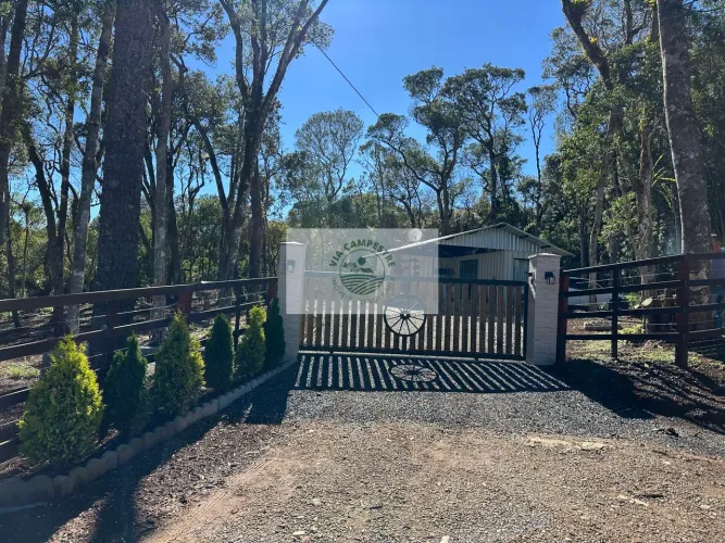 Terreno para sitio com 1.400 m2, com casa container de 1 dormitorio, garagem