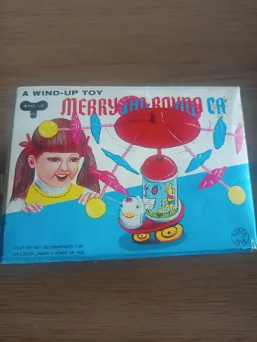 Merry Go Round Car" (Carrinho Carrossel).