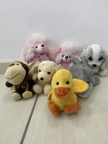 7 bonecos pelúcia