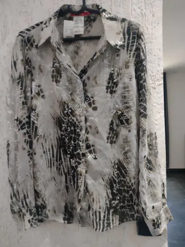 Blusa com estampa animal print Tam 38