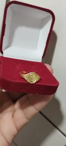 Anel de ouro de santa vendo ou troco valor r$ 1.000 para vender logo