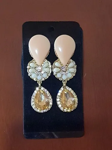 Brinco elegante sofisticado