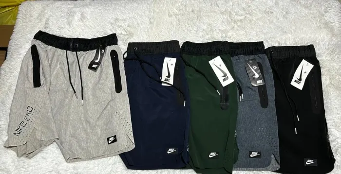 BERMUDAS ANATÔMICAS NIKE - PADRÃO IMPORTADO