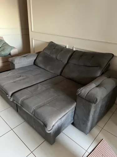 Vendo Sofá Retrátil Reclinável Cinza com molas. 3 lugares.