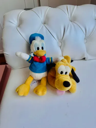 Kit com Pato Donald e Pluto originais, adquiridos nos parques da Disney.