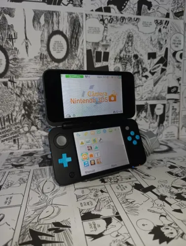 Console New Nintendo 2DS XL na cor Preto e Azul Turquesa. Aparelho em estado impecavel, se