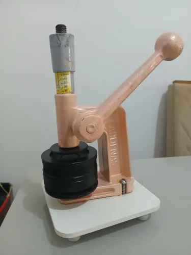 Máquina de bottons