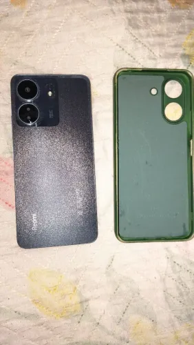 Vendo celular redimi 13C semi novo único dono sem nenhum aranhão  
