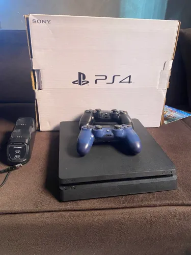 Ps4 slim 1t,com caixa e nota fiscal,dois controles originais e um de primeira linha 