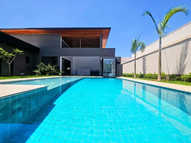 Casa com SAUNA e PISCINA, 5 quartos à venda, 330 m² por R$ 3.700.000 - Condomínio Campos d