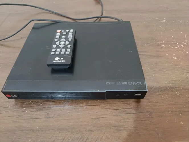 Dvd LG+assessórios ( não entrego e leia anúncio pra não haver dúvidas)