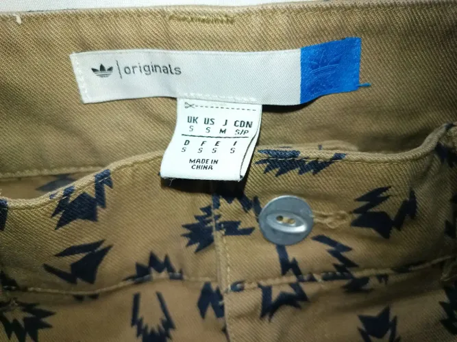 Calça Adidas masculino bem conservada 