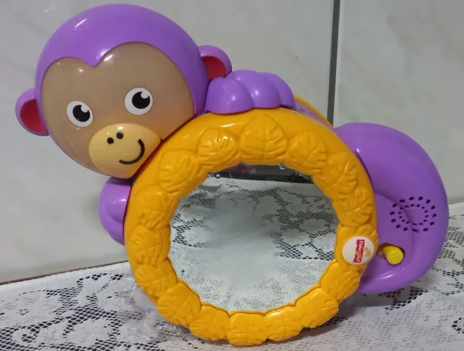 Brinquedo macaquinho musical de atividades Fisher Price